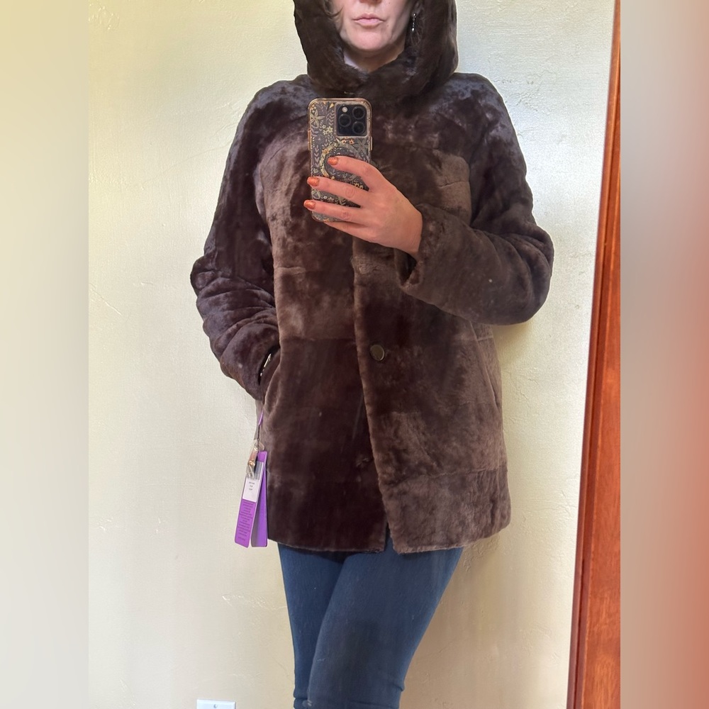 Fur jacket - real sheepskin, mouton 100%. The hood is covered with mink.